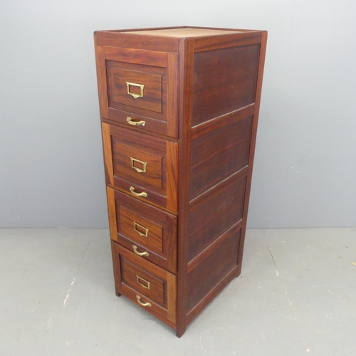 2557 - A mahogany four-drawer filing chest. Width 46cm, height 138cm, depth 62cm.