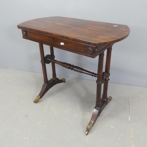 2565 - A Victorian rosewood side table in the manner of Gillows. Length 77cm, height 70cm, depth 42cm.