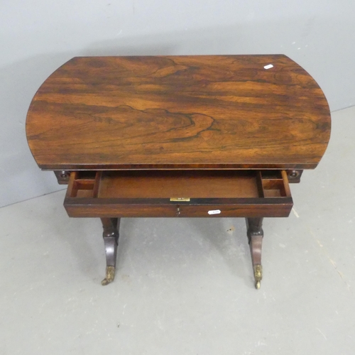 2565 - A Victorian rosewood side table in the manner of Gillows. Length 77cm, height 70cm, depth 42cm.