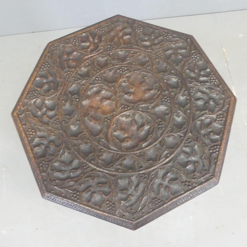 2567 - An Anglo-Indian oak octagonal table, with carved and pierced folate decoration. Width 58cm, height 5... 