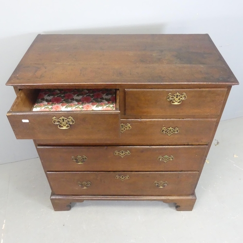 2571 - A Victorian oak two-section chest of two short and three long drawers, raised on bracket feet. Width... 