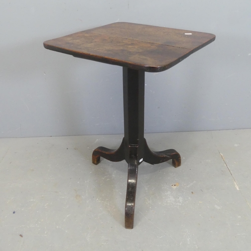 2583 - An early 20th century square oak side table on tripod base. Width 46cm, height 70cm.