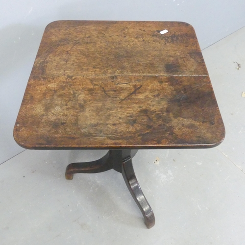 2583 - An early 20th century square oak side table on tripod base. Width 46cm, height 70cm.