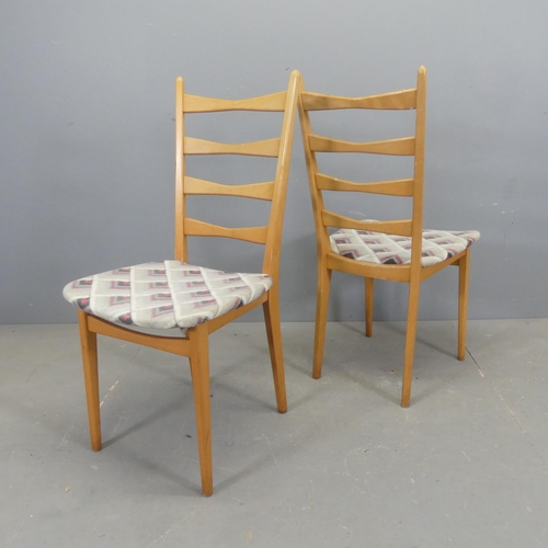 2591 - A set of 4 mid-century teak and upholstered ladderback model 6244 dining chairs, with labels for VEB... 