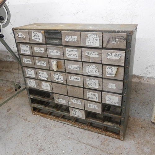 2595 - A vintage painted metal bank of tool drawers. Width 89cm, height 84cm, depth 32cm.