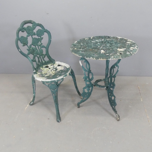 2596 - A painted cast aluminium circular garden table, diameter 57cm, height 67cm, with matching chair.