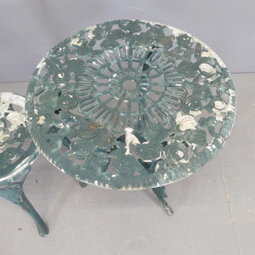 2596 - A painted cast aluminium circular garden table, diameter 57cm, height 67cm, with matching chair.