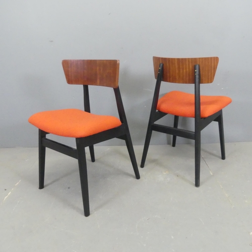 2599 - A set of four modern mid-century style dining chairs.