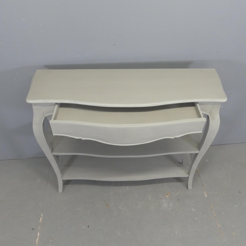 2606 - A continental style painted three-tier console toable, with single drawer and cabriole legs. Width 1... 