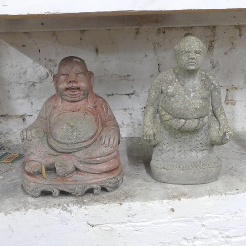 2609 - A painted concrete Buddha statue, height 47cm, and a concrete Sumo wrestler statue. (2)