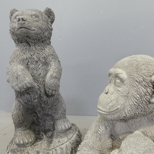 2614 - A concrete bear cup garden statue height 46cm, and a concrete monkey mother and child statue, height... 