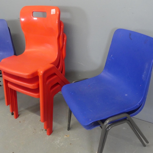 2632 - A set of four Remploy stacking chairs, and a set of three Titan stacking chairs.... 