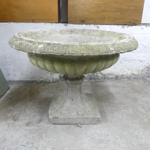 2640 - A weathered concrete two-section garden urn. Diameter 62cm, height 44cm.