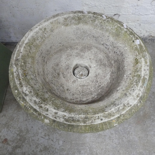 2640 - A weathered concrete two-section garden urn. Diameter 62cm, height 44cm.