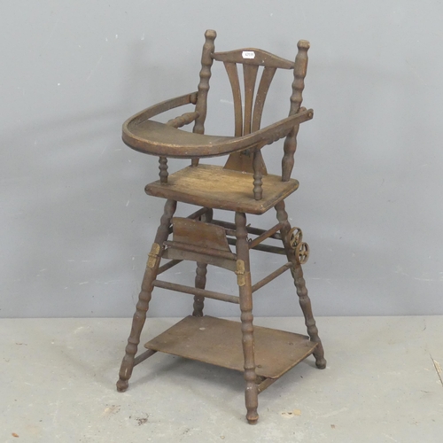 2662 - A French oak metamorphic doll's high chair.