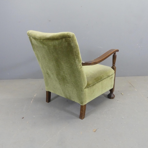 2675 - An early 20th century oak and upholstered parlour open arm chair.