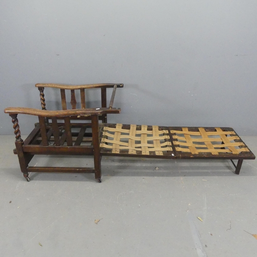 2677 - An early 20th century oak metamorphic plantation chair / lounger, with adjustable back and lifting s... 