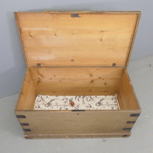 2680 - A vintage stained pine and metal bound blanket box. Width 89cm, height 44cm, depth 48cm.