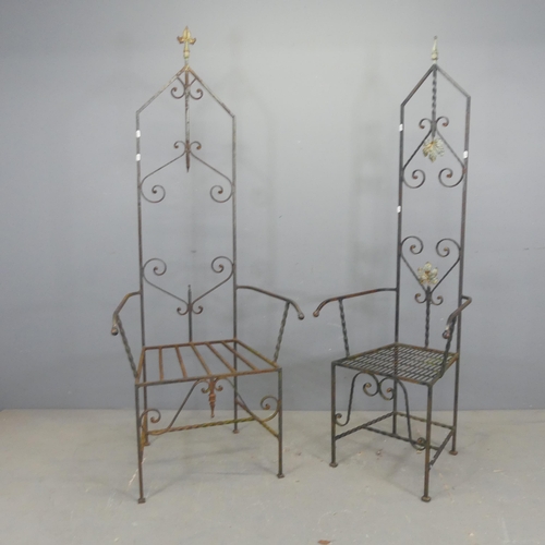 2701 - Two similar wrought iron garden throne chairs. Tallest 182cm.