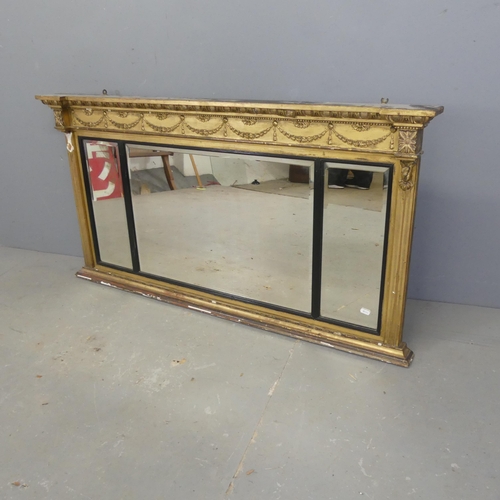 2711 - A Victorian giltwood bevel edged over-mantle mirror, with swag decoration. Width 125cm, height 65cm.