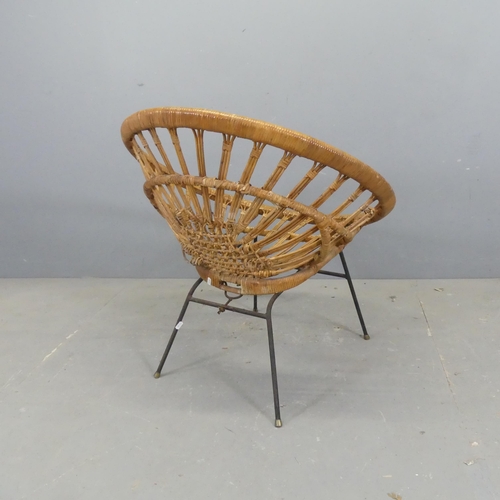 2716 - A circular rattan conservatory chair on tubular metal frame.