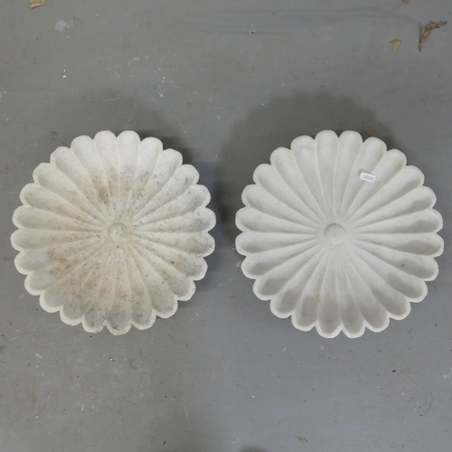 2731 - A pair of floral design marble dishes. Diameter 33cm.