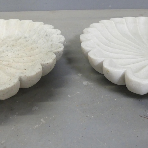 2731 - A pair of floral design marble dishes. Diameter 33cm.