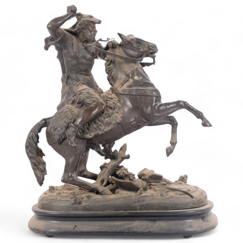 104 - A large spelter horse and warrior, on ebonised stand, H63cm