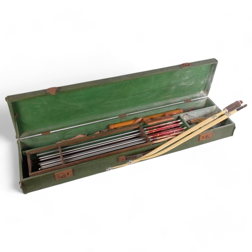 130 - A Vintage Apollo Merlin archery bow, a collection of arrows and accessories, rectangular fitted case... 