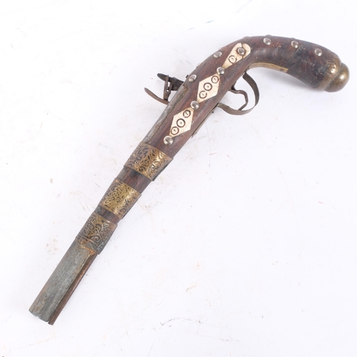 135 - An Ethnic flintlock pistol