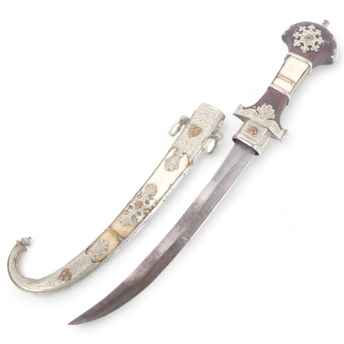 139 - A Moroccan jambiya, turned wood handle with bone and plated mounts, with ornate bone and plated scab... 