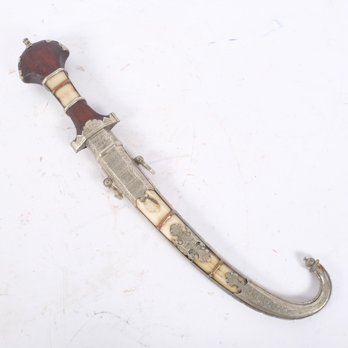 139 - A Moroccan jambiya, turned wood handle with bone and plated mounts, with ornate bone and plated scab... 