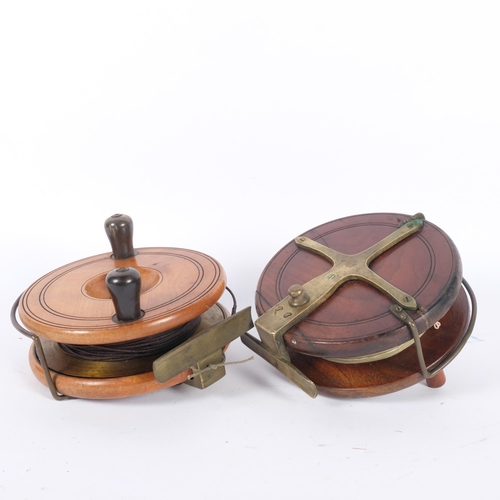 14 - Carter & Company of London - 2 Antique walnut and brass fishing reels, 1 marked to brass cross, and ... 