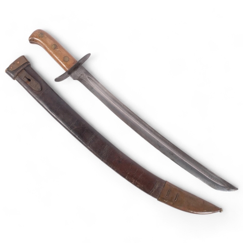 141 - A Japanese Heiho, a Japanese machete made from a Dutch sword, in a leather and brass scabbard, the s... 