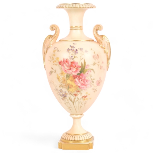 192 - A Royal Worcester Blush Ivory porcelain pedestal urn vase, model no. 1969, reg. no. 308314, 31cm