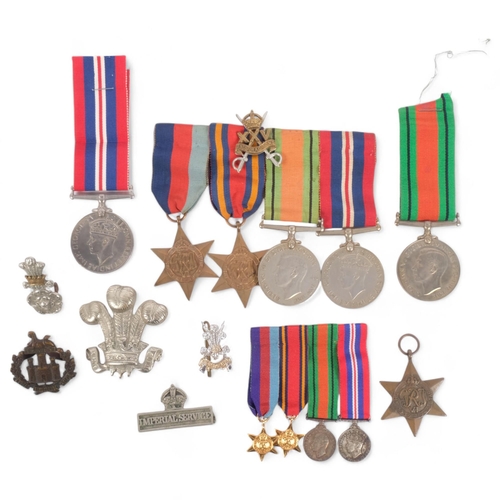 210 - A group of Second World War medals, including a trio with Burma Star, and a 25th Dragoons badge, mat... 