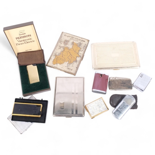 216 - A collection of various cigarette lighters, cigarette boxes, etc