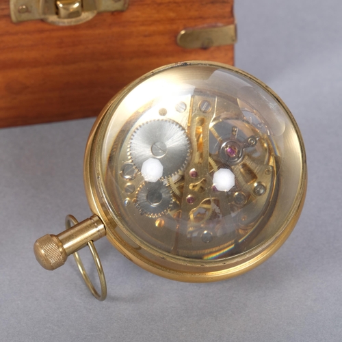 225 - A reproduction magnifying spherical clock, cased