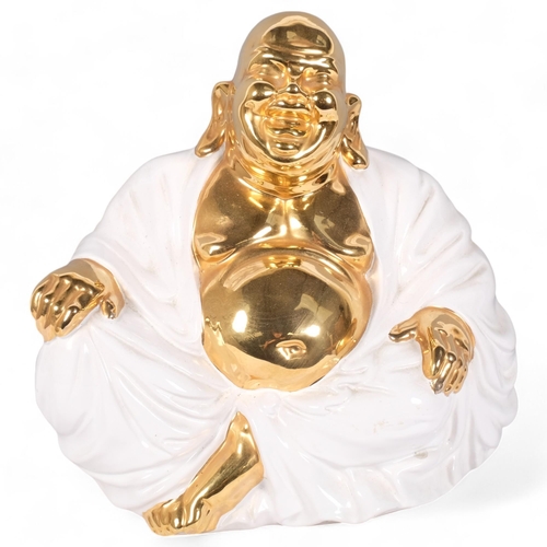 237 - A white glazed gold-finished ceramic seated Buddha, H29cm