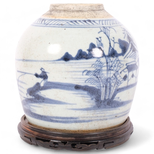 247 - A Chinese blue and white porcelain jar, on carved wood stand, overall height 18cm, no lid