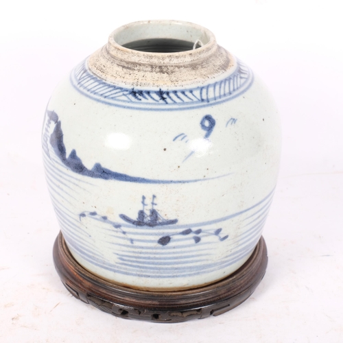 247 - A Chinese blue and white porcelain jar, on carved wood stand, overall height 18cm, no lid