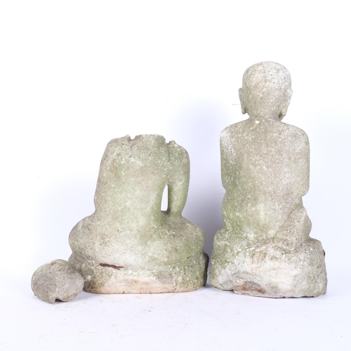 249 - A concrete figure of a seated Buddha (head broken off), H37cm, and a concrete figure of a praying fi... 