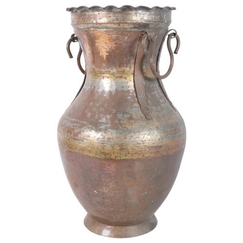 300 - A large Middle Eastern Islamic copper water jug, 49cm