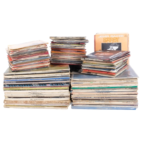 306 - A large quantity of vinyl LPs and 7