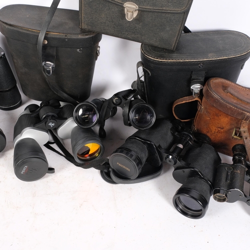 310 - A quantity of Vintage binoculars, including a pair of Hilkinson 12x50 wide angle field binoculars an... 