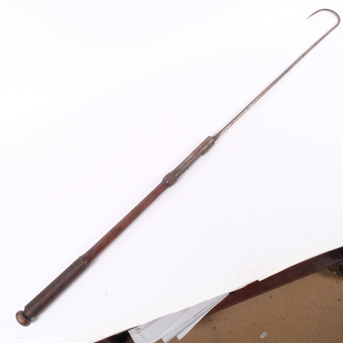 41 - An Antique fishing gaff, with ornate turned wood walnut handle, marked McCririck, Ayr, length fully ... 