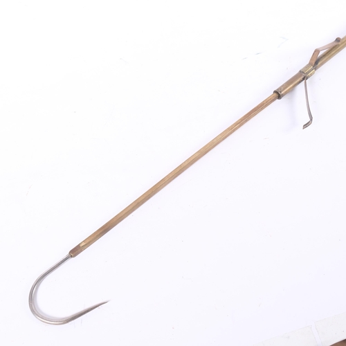 43 - An Antique brass-bodied telescopic fishing gaff, unmarked