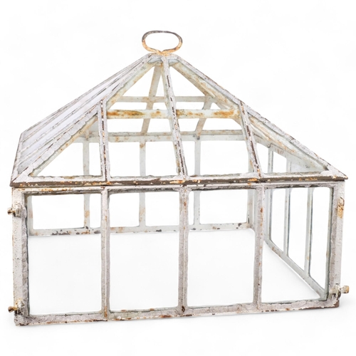 57 - A large Victorian cast-iron and glass garden cloche, in weathered condition, removeable top section,... 