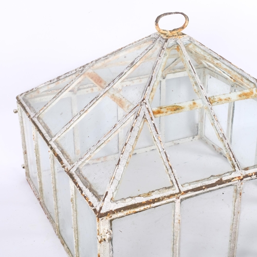 57 - A large Victorian cast-iron and glass garden cloche, in weathered condition, removeable top section,... 