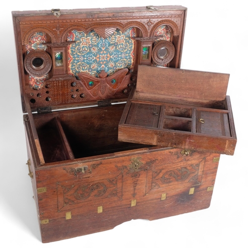 74 - An Anglo-Indian teak travelling box, rising lid revealing a lift-out fitted interior and compartment... 